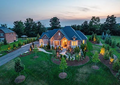 Front yard and walkway landscape design in East Garafraxa by Tumber & Associates