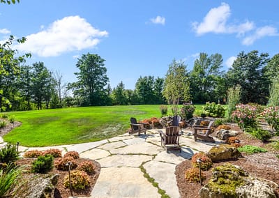 Back yard and patio walkway landscape design in East Garafraxa by Tumber & Associates