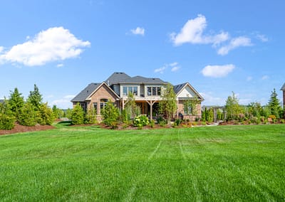 Front yard and walkway landscape design in East Garafraxa by Tumber & Associates