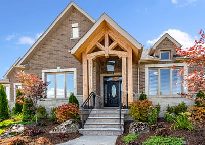 Front yard and home entrance landscape design in East Garafraxa by Tumber & Associates