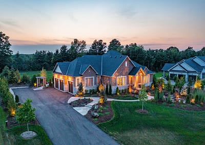 Front yard and walkway landscape design in East Garafraxa by Tumber & Associates