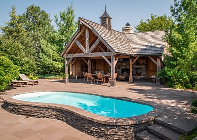 Hockley Valley Retreat Backyard Landscape Design, Pool, and Outdoor Structure by Tumber & Associates