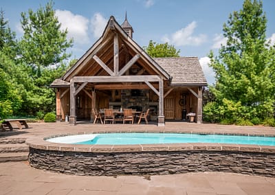 Hockley Valley Retreat Backyard Landscape Design, Pool, and Outdoor Structure by Tumber & Associates