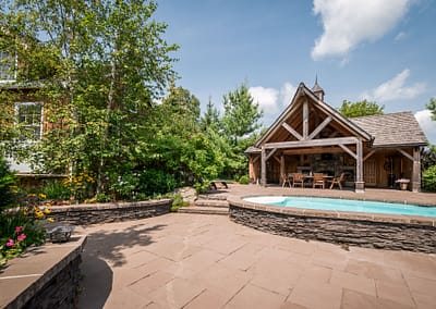 Hockley Valley Retreat Backyard Landscape Design, Pool, and Outdoor Structure by Tumber & Associates