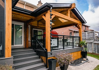 Backyard patio and pool area landscape design renovation by Tumber and Associates in Orangeville