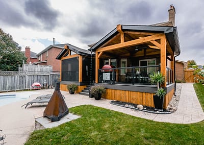 Backyard patio and pool area landscape design renovation by Tumber and Associates in Orangeville