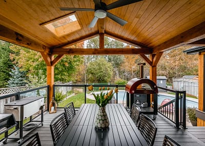 Backyard patio and pool area landscape design renovation by Tumber and Associates in Orangeville