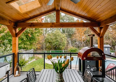 Backyard patio and pool area landscape design renovation by Tumber and Associates in Orangeville