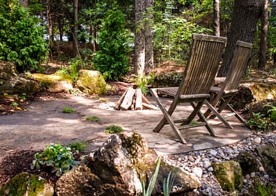 Natural Swim Pond Landscape Design by Tumber & Associates in Orangeville