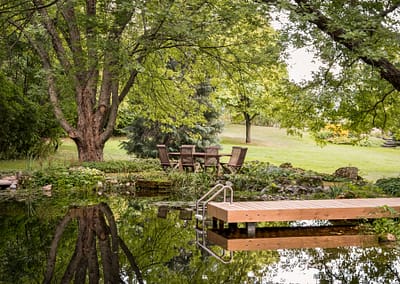 Natural Swim Pond Landscape Design by Tumber & Associates in Orangeville