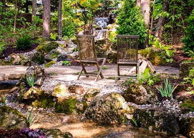 Natural Swim Pond Landscape Design by Tumber & Associates in Orangeville